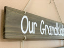 Grandkids sign with names, state maps and mileages. Grand kids directional sign wood on rope