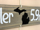 Grandkids sign with names, state maps and mileages. Grand kids directional sign wood on rope